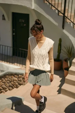Pleated Raw-Hem Mini Skirt